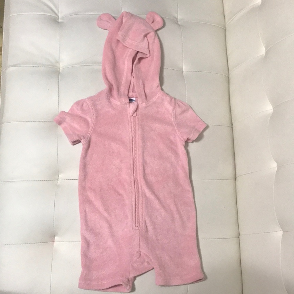 Adorable pink onesie with ears.